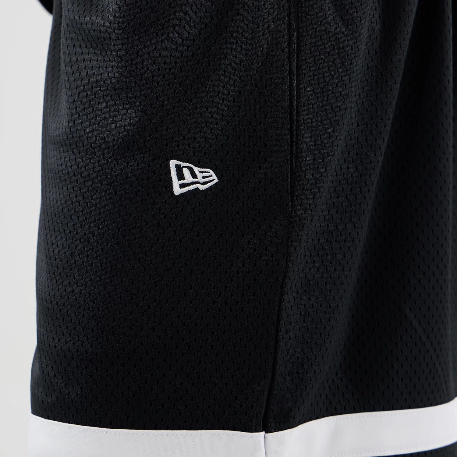 The model is wearing these MLB Mesh LA Dodgers Oversized Shorts in black. 5