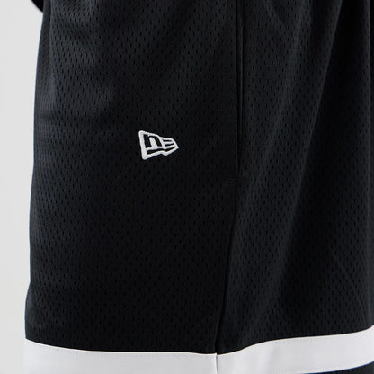 The model is wearing these MLB Mesh LA Dodgers Oversized Shorts in black. 5