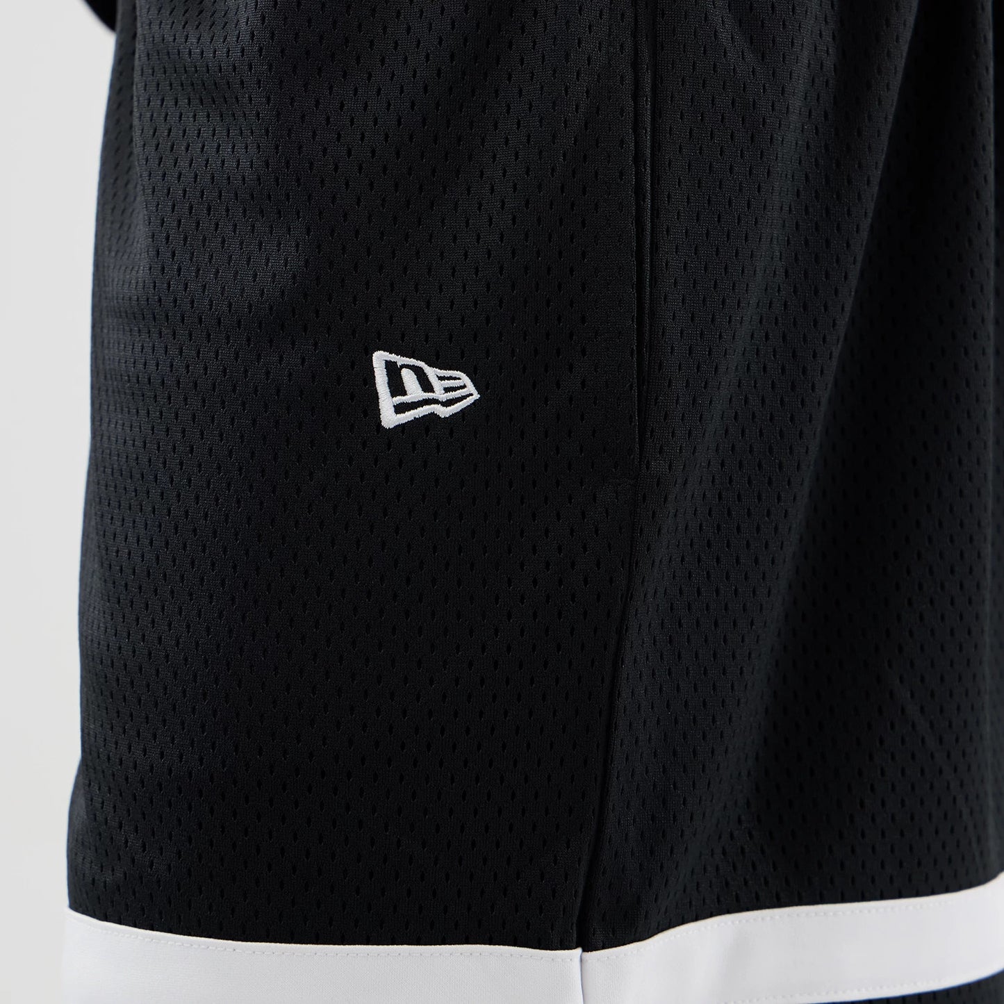 The model is wearing these MLB Mesh LA Dodgers Oversized Shorts in black. 5