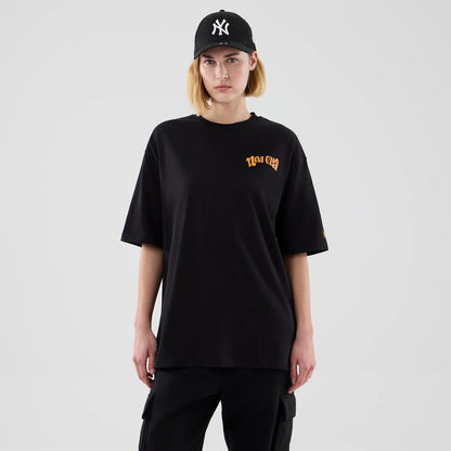 The model is wearing this New Era Food Graphic Oversized T-Shirt in black. 4
