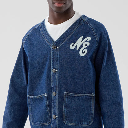 The model is wearing this New Era Denim Worker Jacket in dark blue. 3