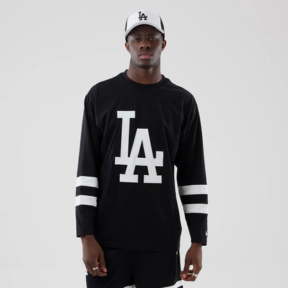 The model is wearing this MLB LA Dodgers Oversized Long Sleeve T-Shirt in black. 3