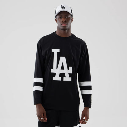 The model is wearing this MLB LA Dodgers Oversized Long Sleeve T-Shirt in black. 3