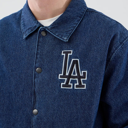 The model is wearing this MLB Coaches LA Dodgers Jacket in dark blue. 4