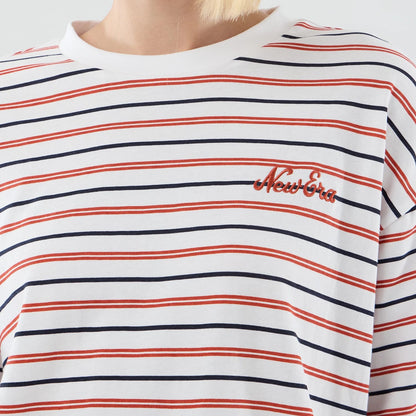The model is wearing this New Era Stripe Oversized T-Shirt in white. 6