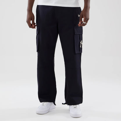 The model is wearing these MLB New York Yankees Cargo Trousers in navy. 1