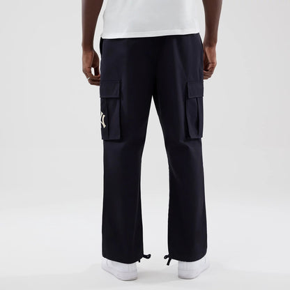 The model is wearing these MLB New York Yankees Cargo Trousers in navy. 2