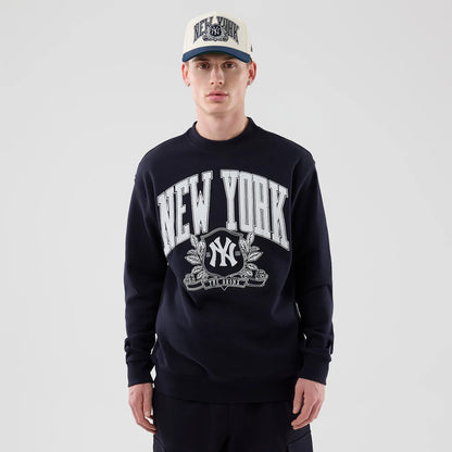 The model is wearing this MLB Arch Graphic New York Yankees Oversized Crew Neck Sweater in navy. 3