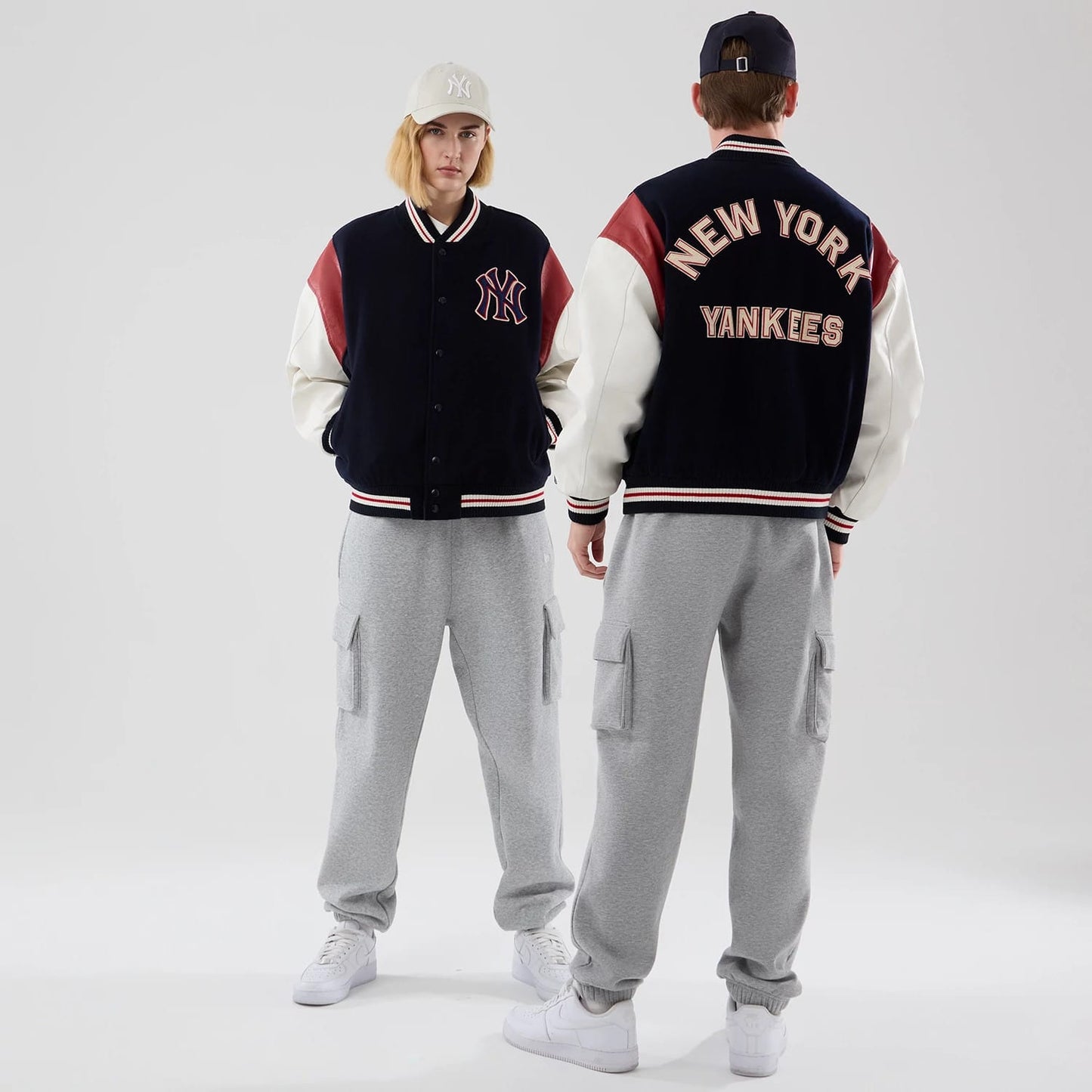 The model is wearing this MLB Varsity New York Yankees Jacket in navy. 1