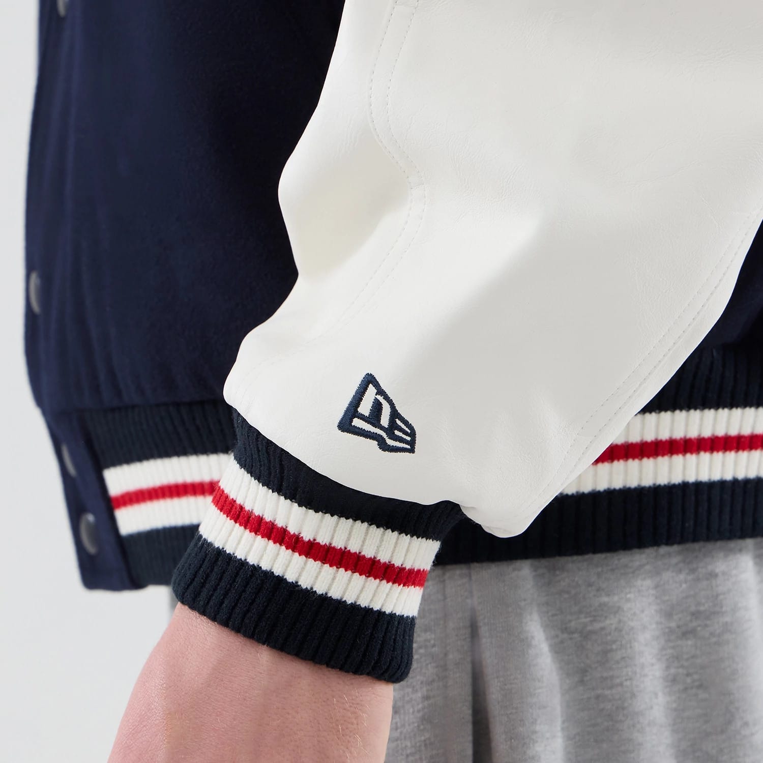The model is wearing this MLB Varsity New York Yankees Jacket in navy. 7