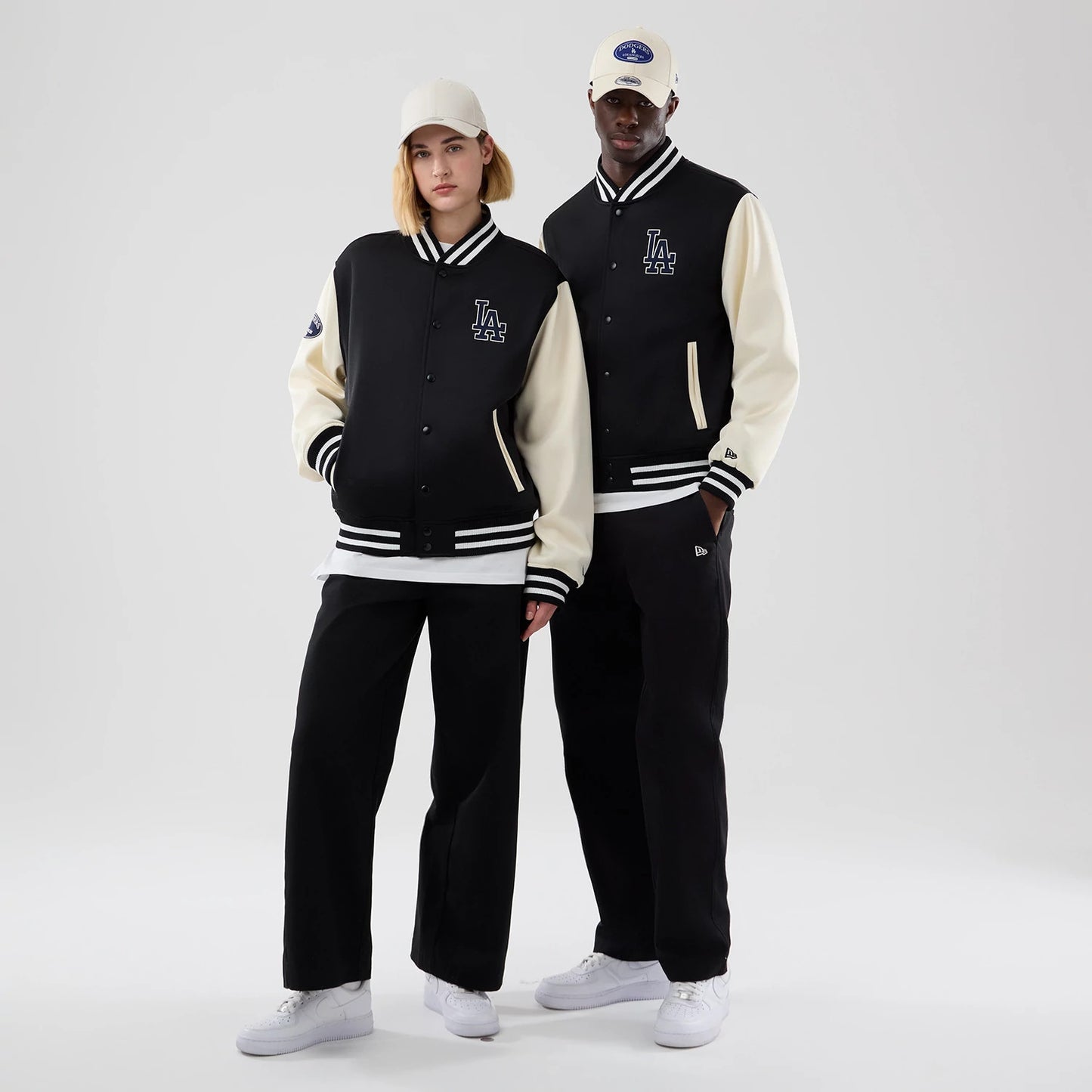 The model is wearing this MLB Jersey Bomber LA Dodgers Jacket in black. 1