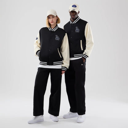 The model is wearing this MLB Jersey Bomber LA Dodgers Jacket in black. 1