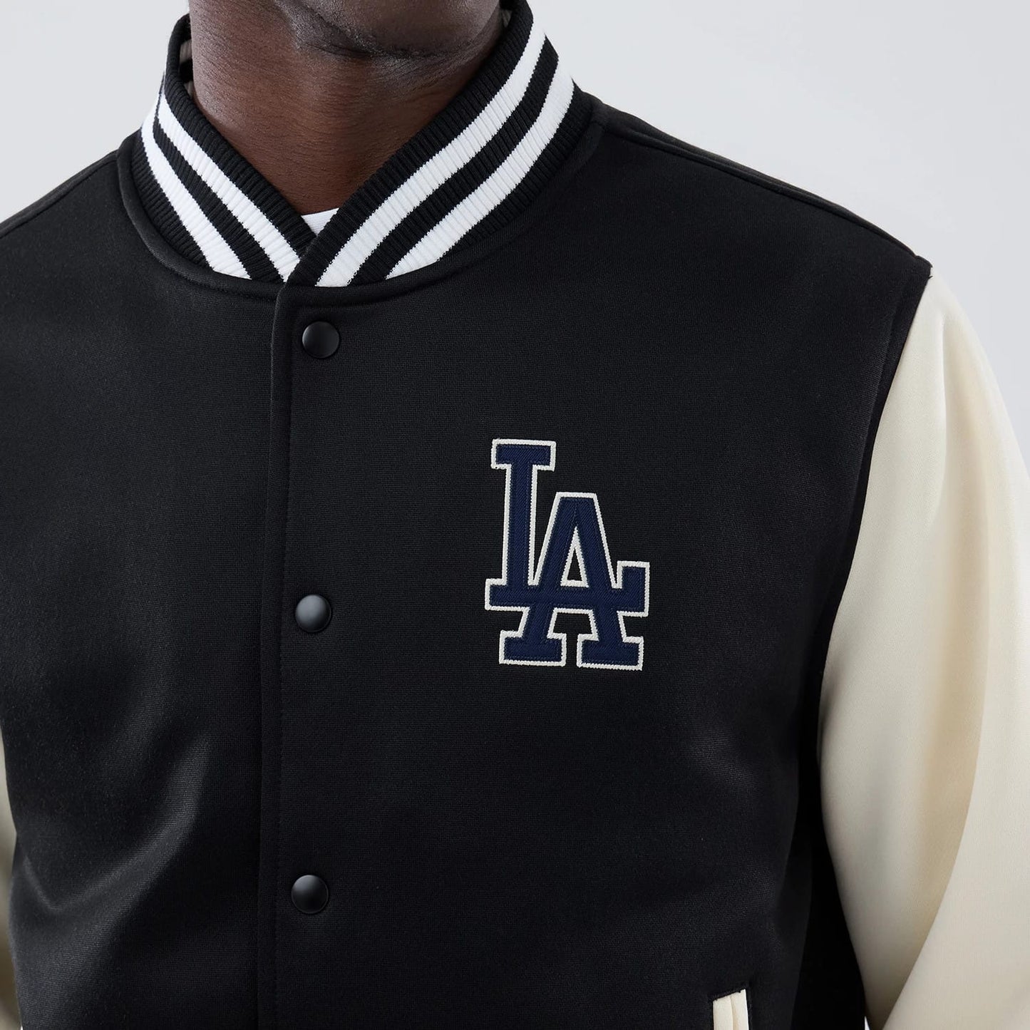 The model is wearing this MLB Jersey Bomber LA Dodgers Jacket in black. 5