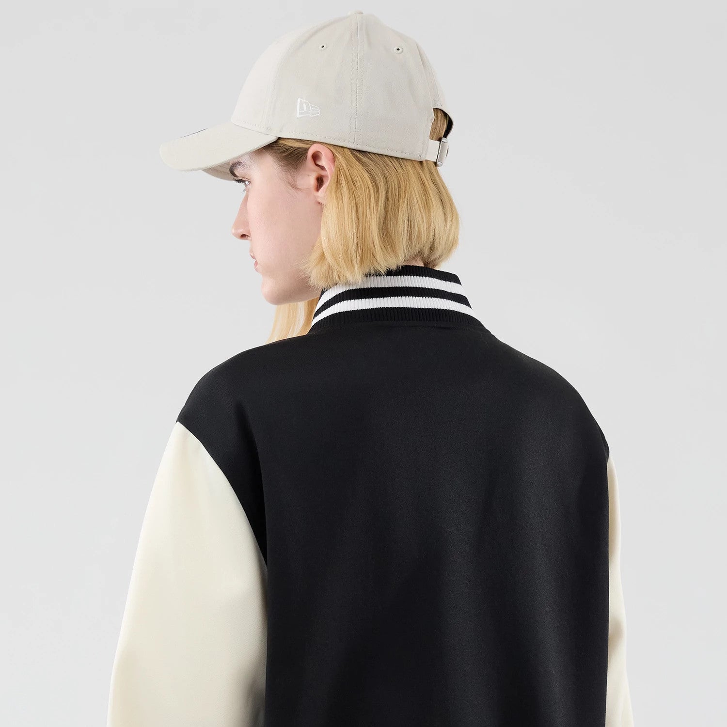 The model is wearing this MLB Jersey Bomber LA Dodgers Jacket in black. 8