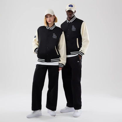 The model is wearing this MLB Jersey Bomber LA Dodgers Jacket in black. 1