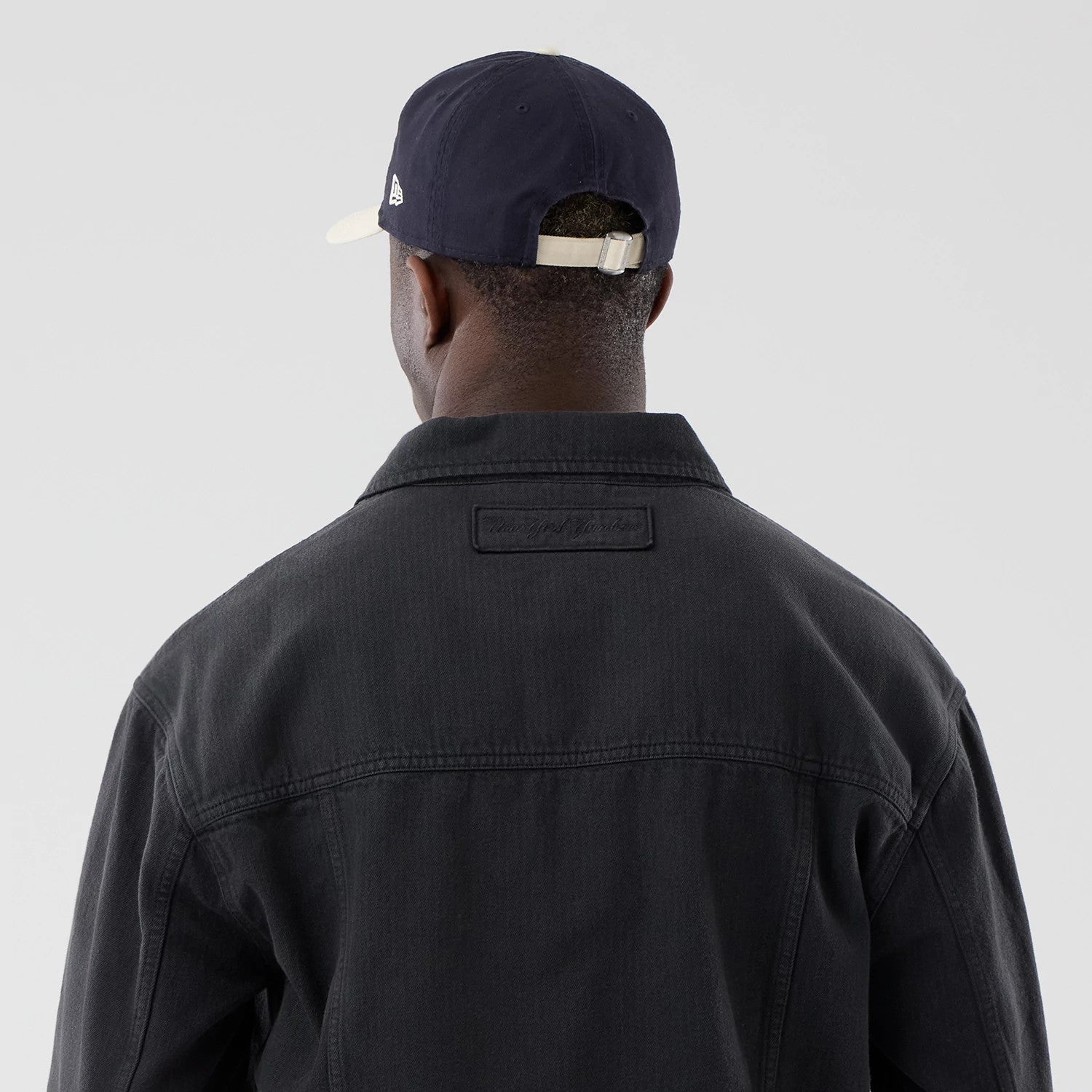The model is wearing this MLB Stripe Denim New York Yankees Jacket in grey. 7