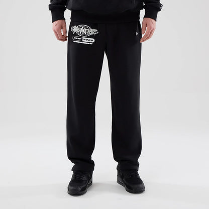 The model is wearing these MLB Logo Graphic New York Yankees Straight Leg Joggers in black. 1