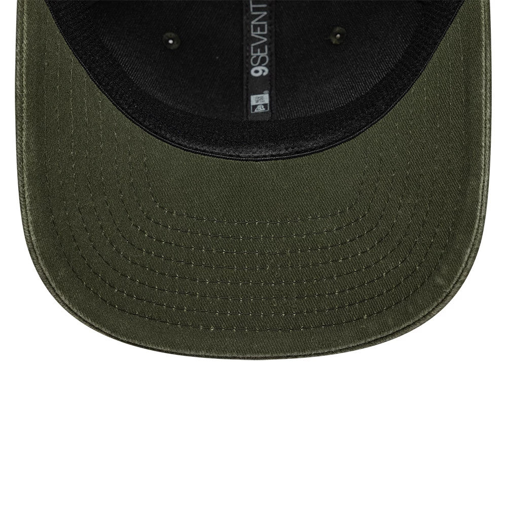 Moto Guzzi Logo Green New Era 9SEVENTY Stretch Snap Adjustable Cap, inside view showing a black sweatband, the 9SEVENTY label, New Era and MLB logos on the taping, and detailed stitching on the green curved visor.
