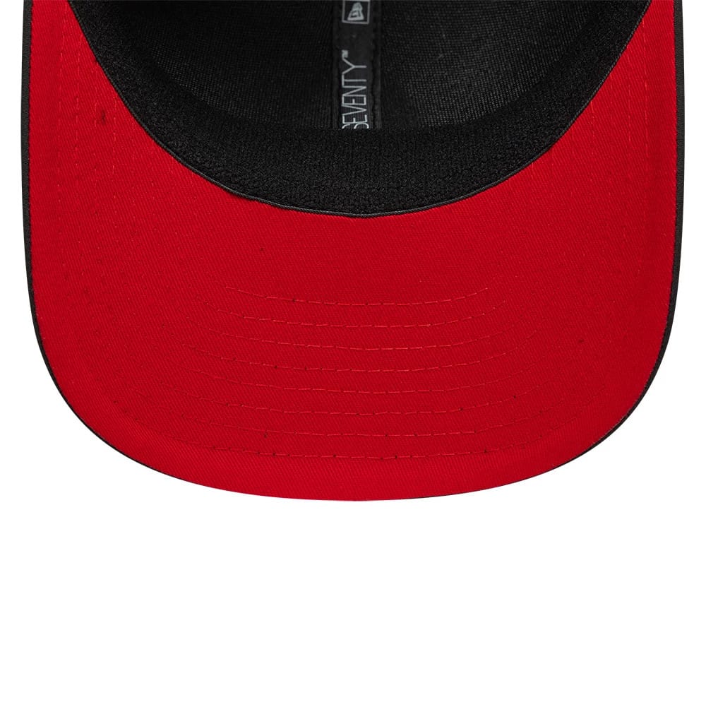 Pictured is this AC Milan Featherweight Poly 9SEVENTY Stretch Snap cap in black. 2