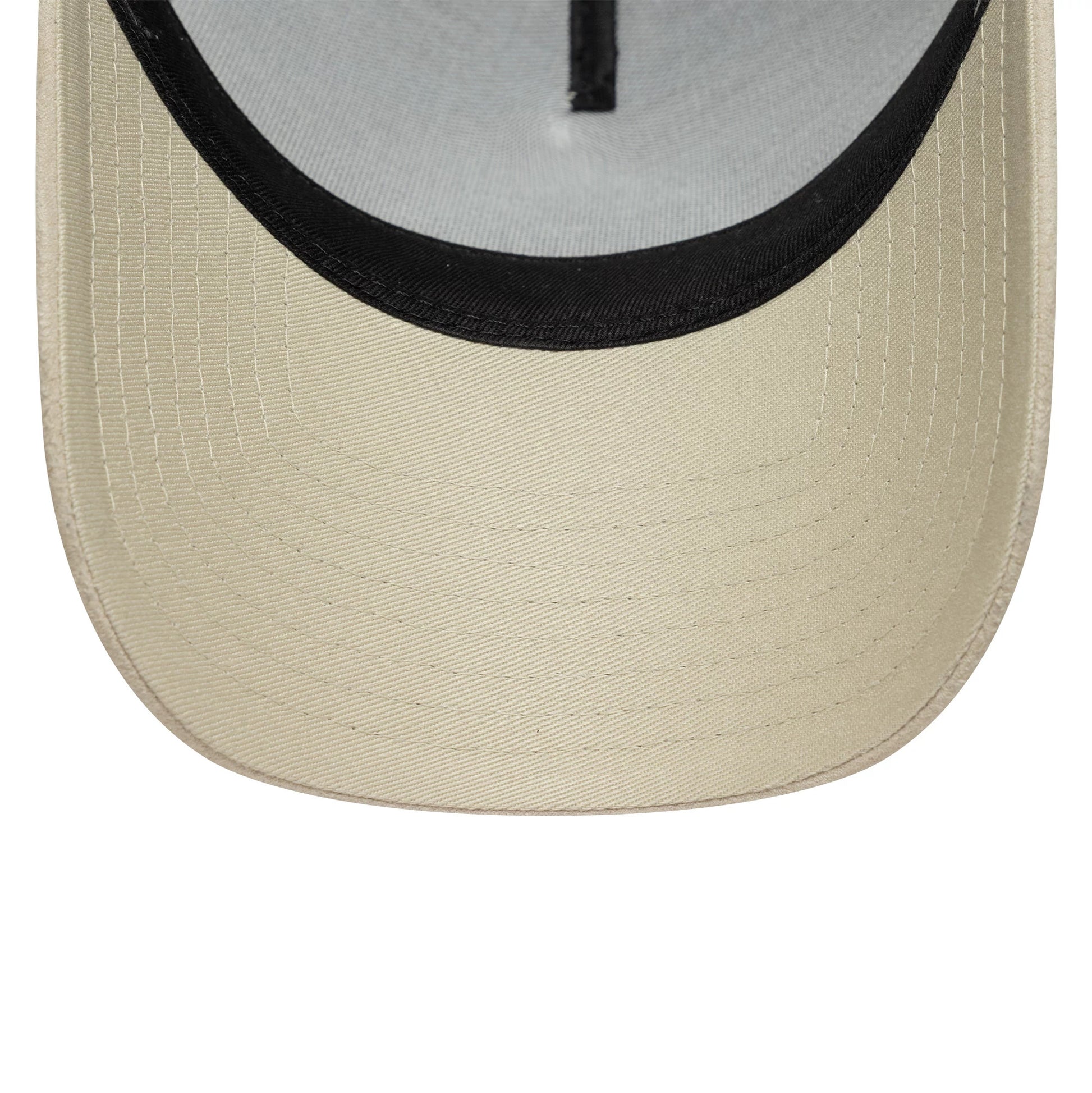 Pictured is this Newcastle United FC Faux Suede 9FORTY E-Frame Trucker cap in cream. 5