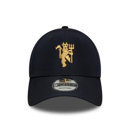 Pictured is this Manchester United FC Gold 9FORTY cap in navy. 2