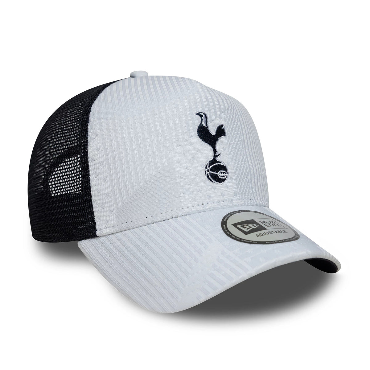 Tottenham Hotspur FC Pattern Knit White New Era 9FORTY E-Frame Trucker Adjustable Cap, three-quarter view showing the black embroidered cockerel logo on the white front panel, black mesh side and back panels.