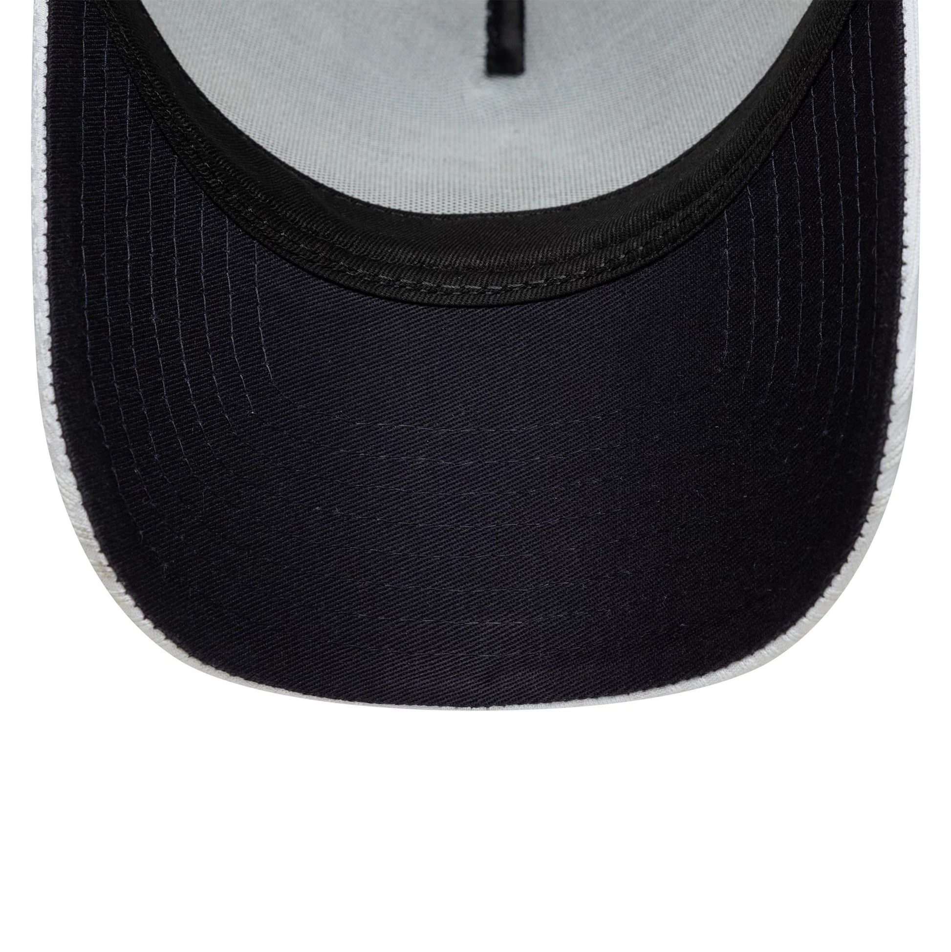 Pictured is this Tottenham Hotspur FC Pattern Knit 9FORTY E-Frame Trucker cap in white. 2