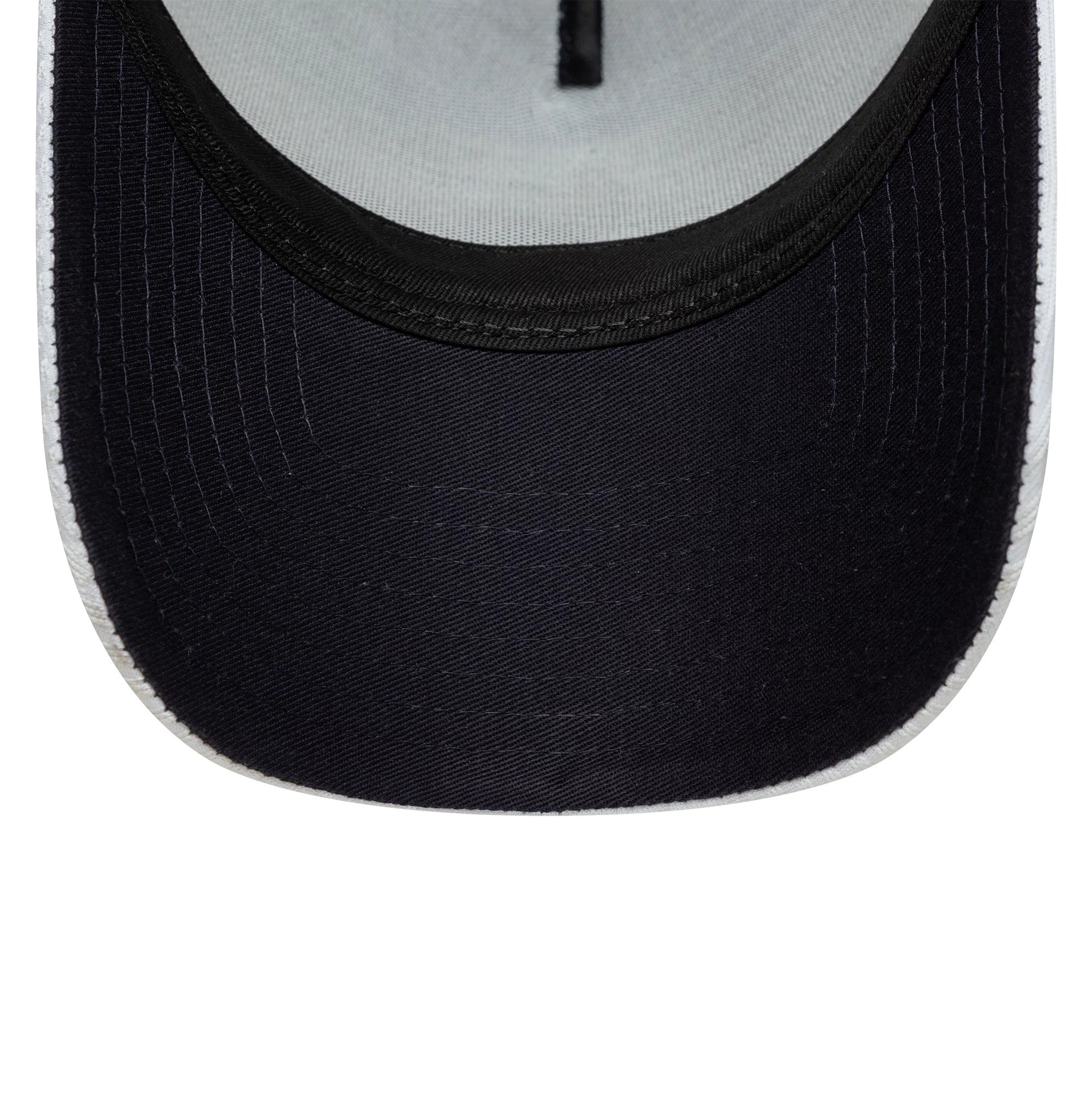 Pictured is this Tottenham Hotspur FC Pattern Knit 9FORTY E-Frame Trucker cap in white. 2