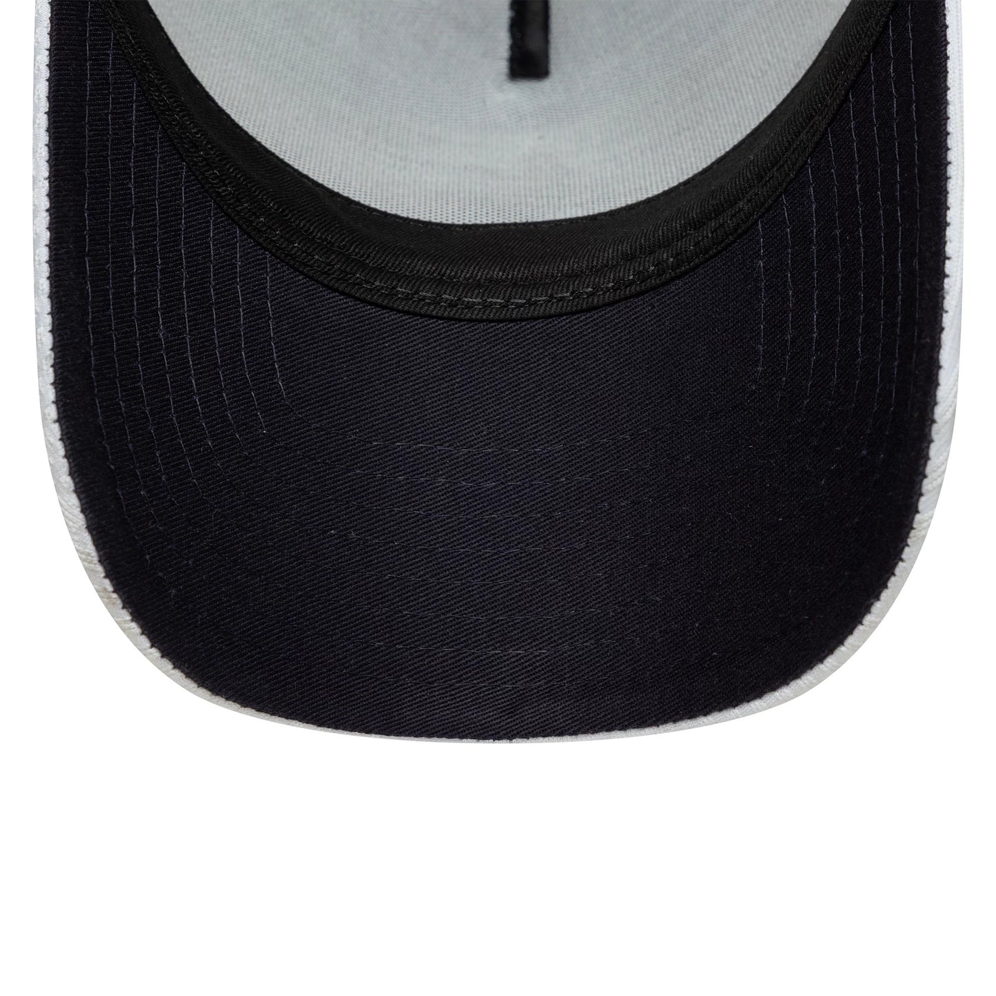 Pictured is this Tottenham Hotspur FC Pattern Knit 9FORTY E-Frame Trucker cap in white. 2