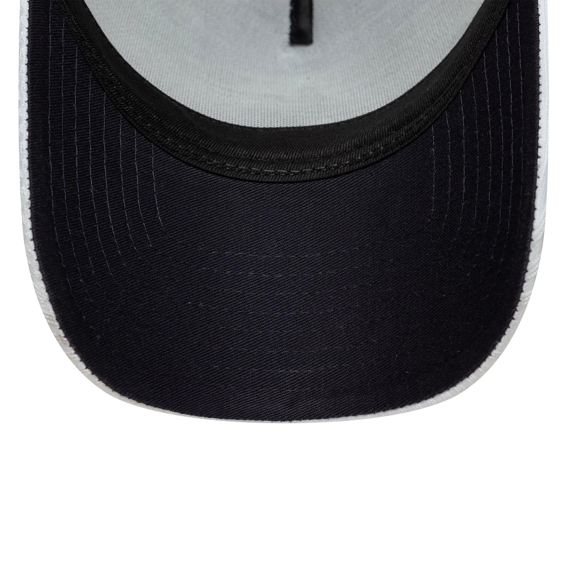 Pictured is this Tottenham Hotspur FC Pattern Knit 9FORTY E-Frame Trucker cap in white. 2