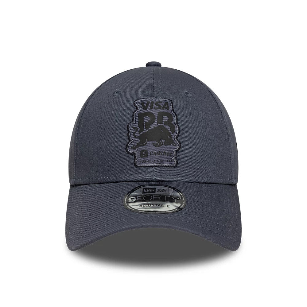 Visa Cash App Racing Bulls Grey New Era 9FORTY Adjustable Cap, front view showing a black embroidered racing bulls graphic with branding on the grey front panel, a curved grey visor, and a 9FORTY size sticker on the visor.