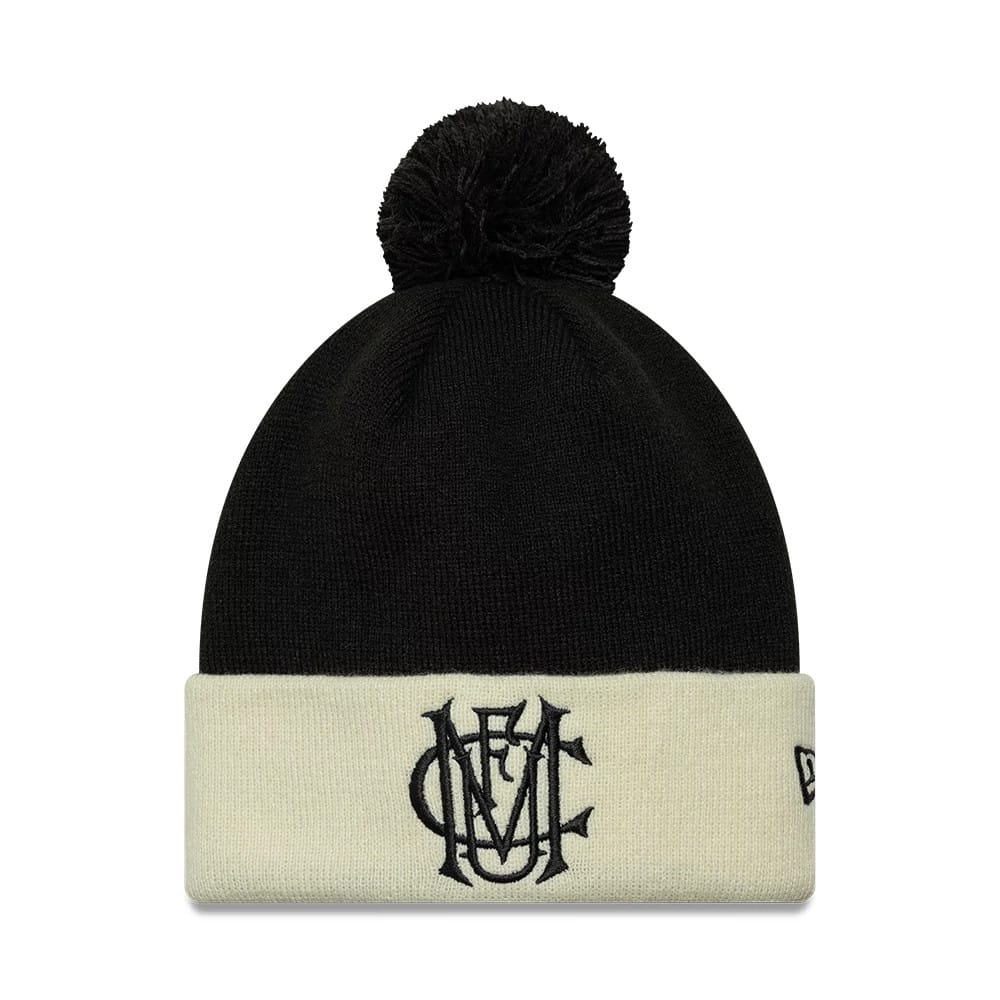 Pictured is this Manchester United FC Monogram Cuff Knit Beanie hat in black. 1