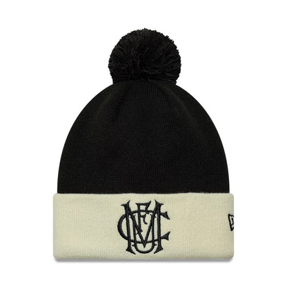 Pictured is this Manchester United FC Monogram Cuff Knit Beanie hat in black. 1
