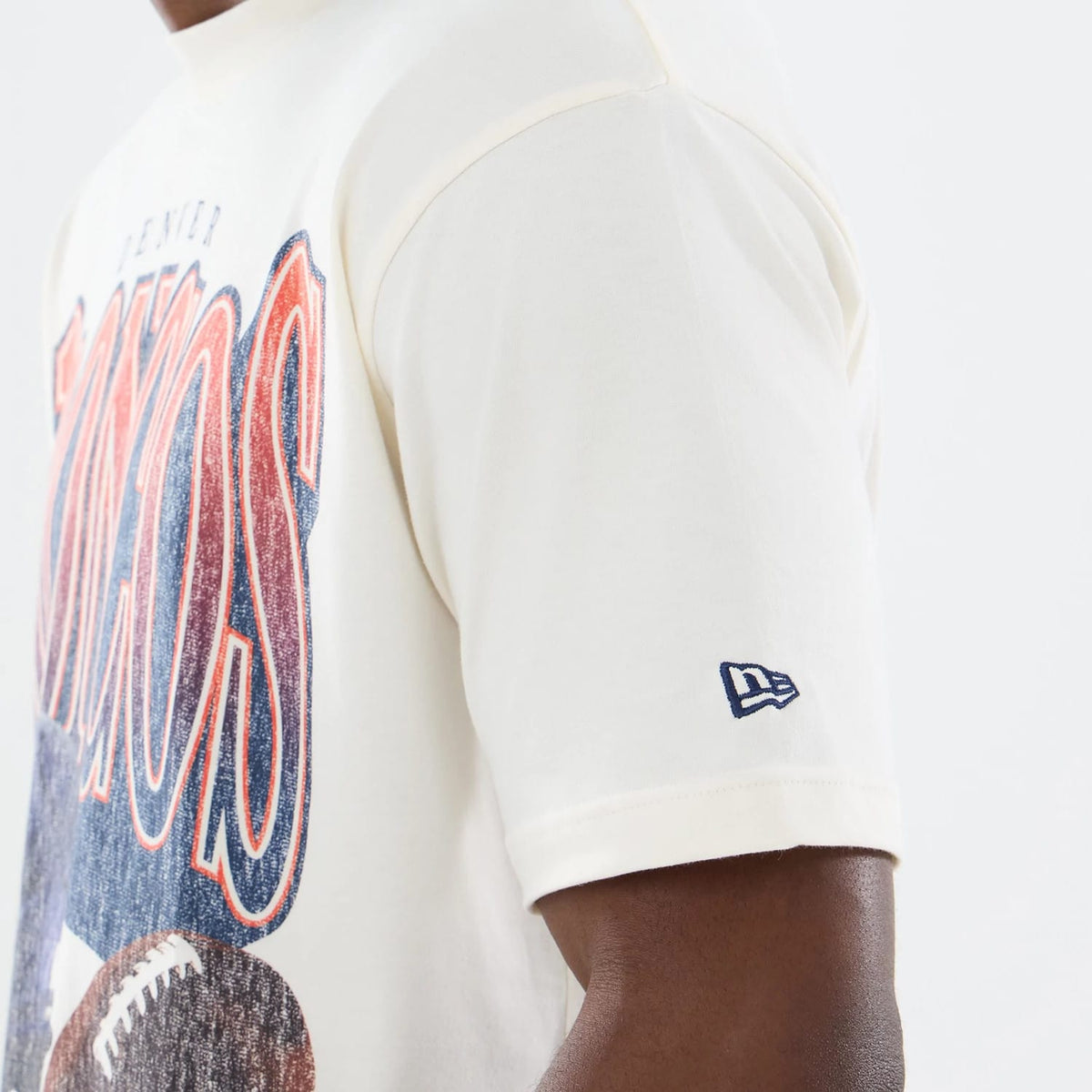 The model is wearing this NFL Sport Classic Denver Broncos T-Shirt in Cream. 5