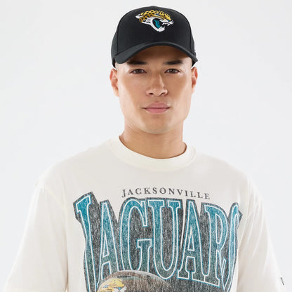 The model is wearing this NFL Sport Classic Jacksonville Jaguars T-Shirt in Cream. 6