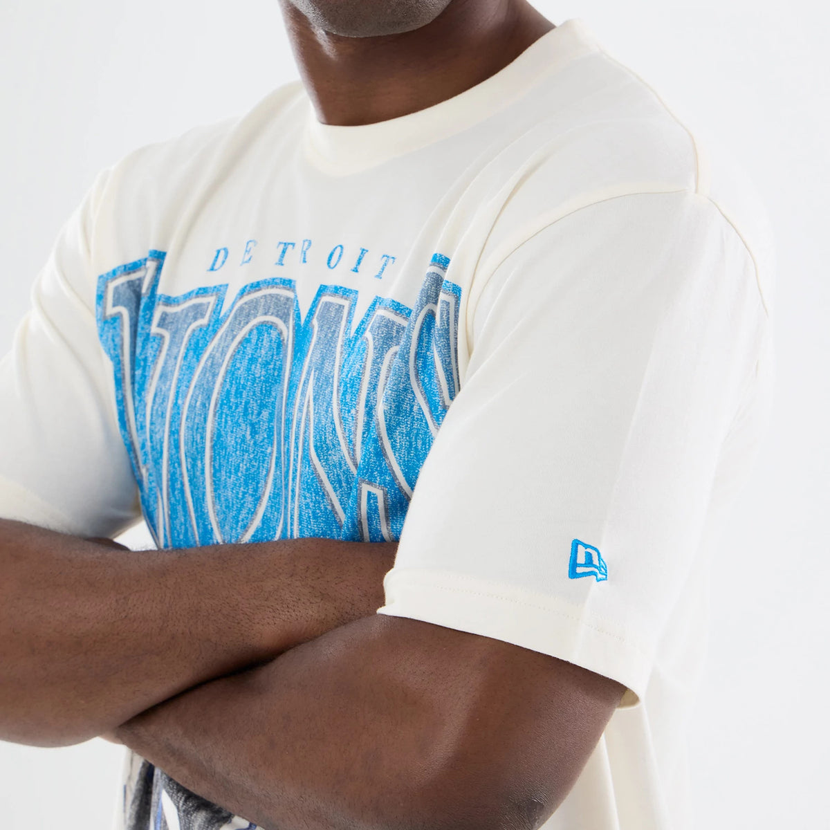 The model is wearing this NFL Sport Classic Detroit Lions T-Shirt in cream. 5