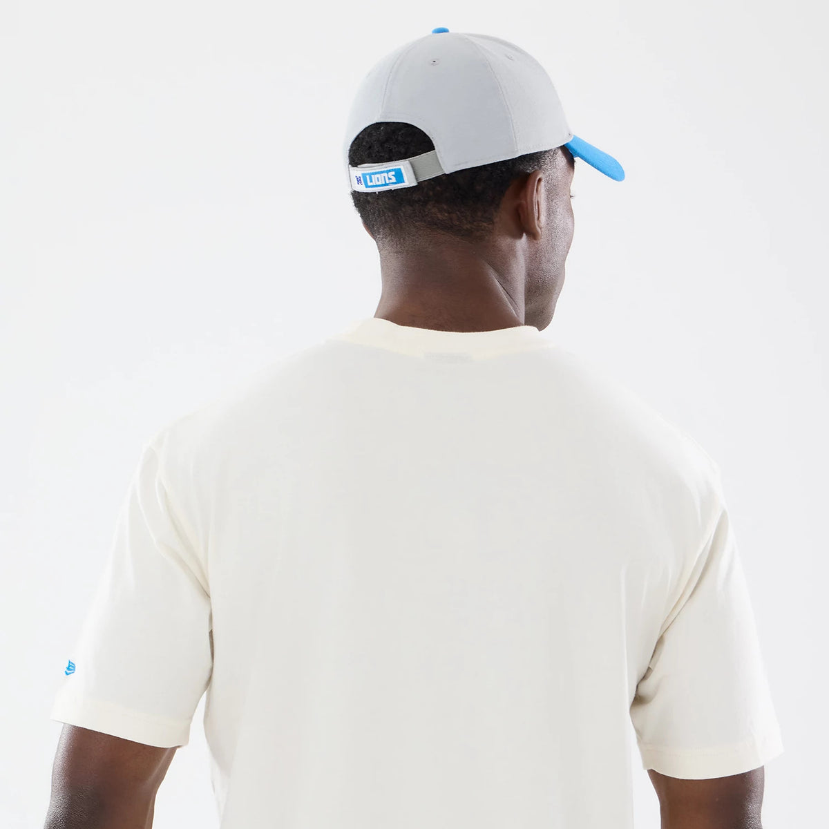 The model is wearing this NFL Sport Classic Detroit Lions T-Shirt in cream. 7