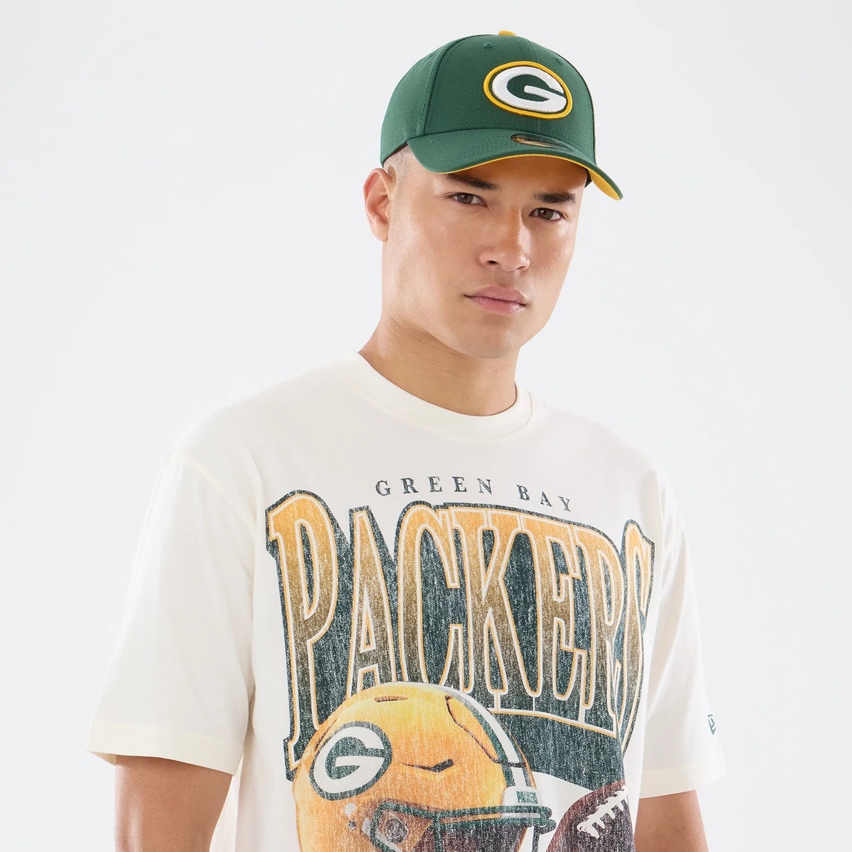 The model is wearing this NFL Sport Classic Green Bay Packers T-Shirt in Cream. 5