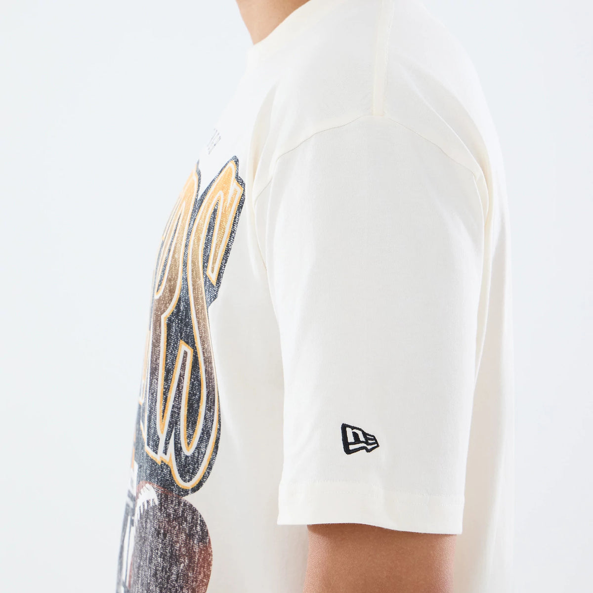 The model is wearing this NFL Sport Classic Pittsburgh Steelers T-Shirt in cream. 6