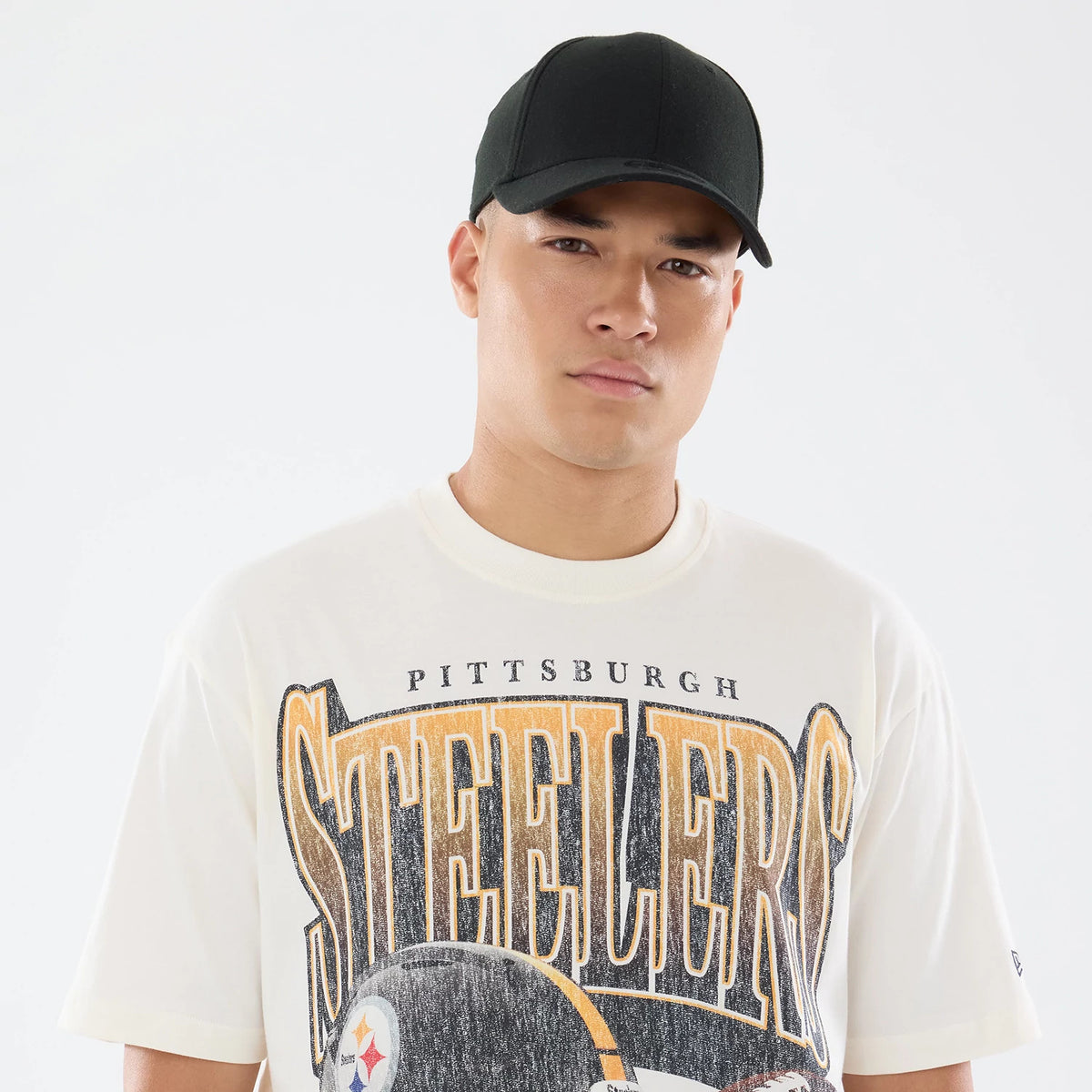 The model is wearing this NFL Sport Classic Pittsburgh Steelers T-Shirt in cream. 5