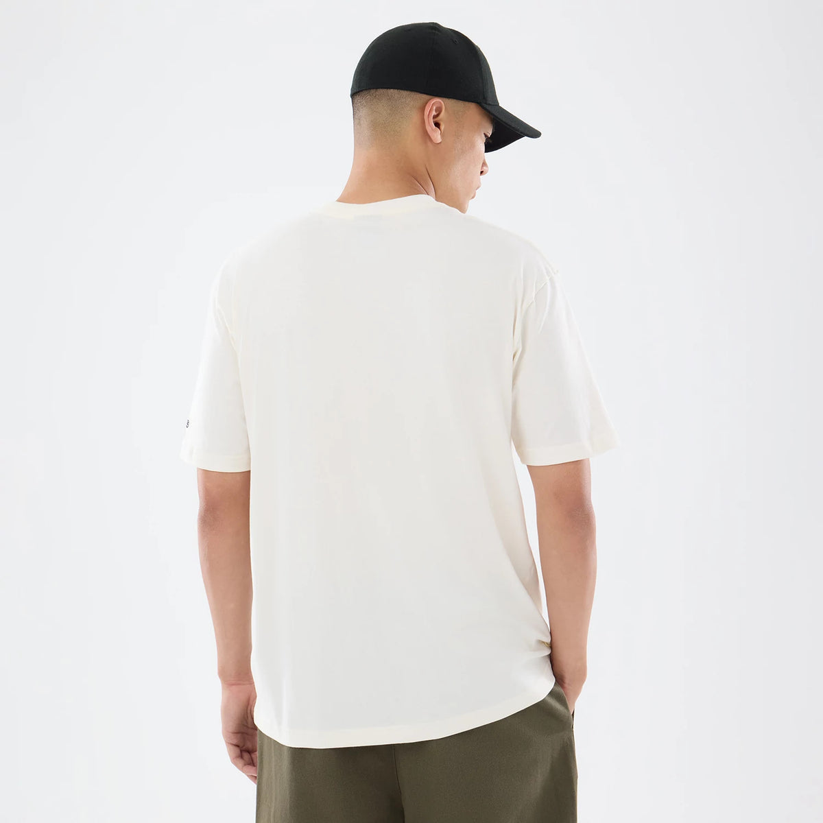 The model is wearing this NFL Sport Classic Pittsburgh Steelers T-Shirt in cream. 2