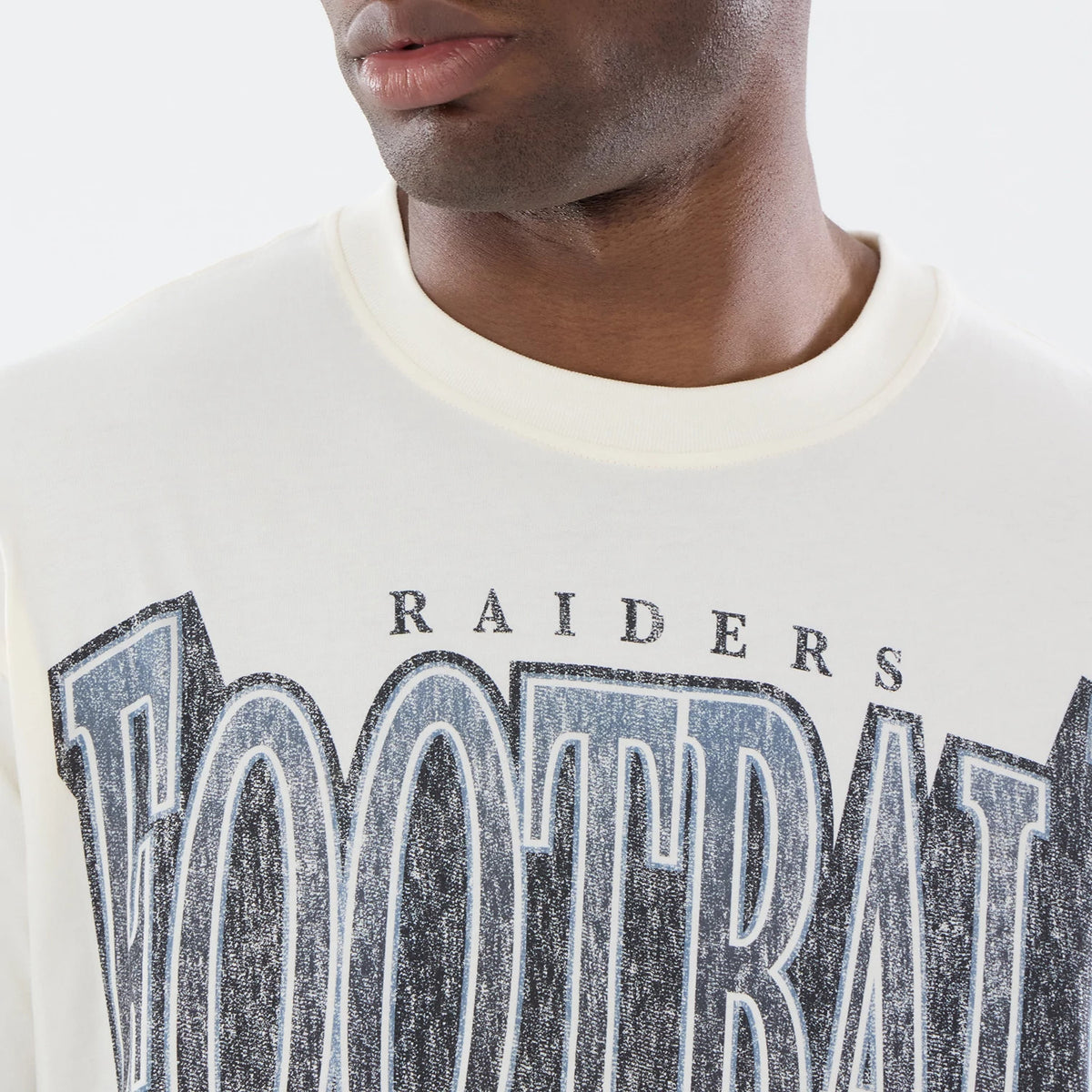The model is wearing this NFL Sport Classic Las Vegas Raiders T-Shirt in cream. 4