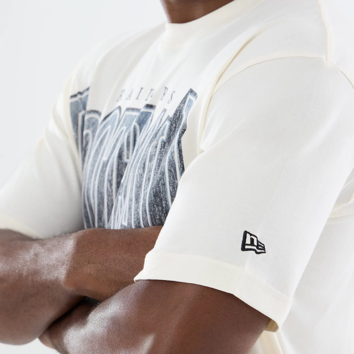 The model is wearing this NFL Sport Classic Las Vegas Raiders T-Shirt in cream. 6