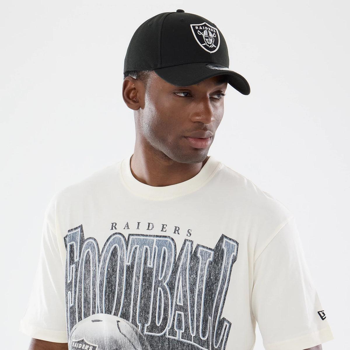 The model is wearing this NFL Sport Classic Las Vegas Raiders T-Shirt in cream. 5