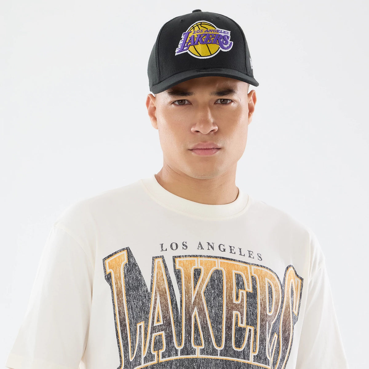 The model is wearing this NBA Sport Classic LA Lakers T-Shirt in cream. 6
