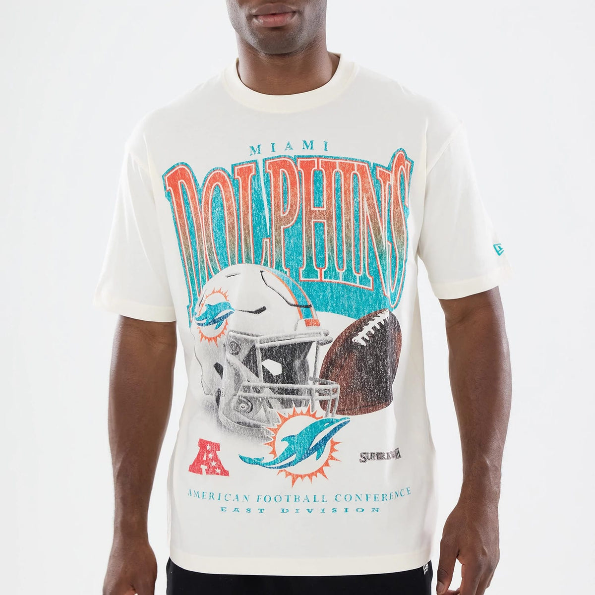 The model is wearing this NFL Sport Classic Miami Dolphins T-Shirt in cream. 3