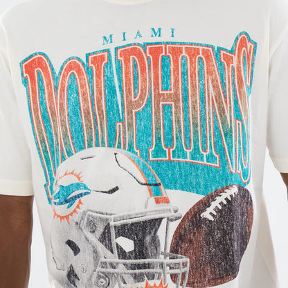 The model is wearing this NFL Sport Classic Miami Dolphins T-Shirt in cream. 4