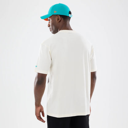 The model is wearing this NFL Sport Classic Miami Dolphins T-Shirt in cream. 2