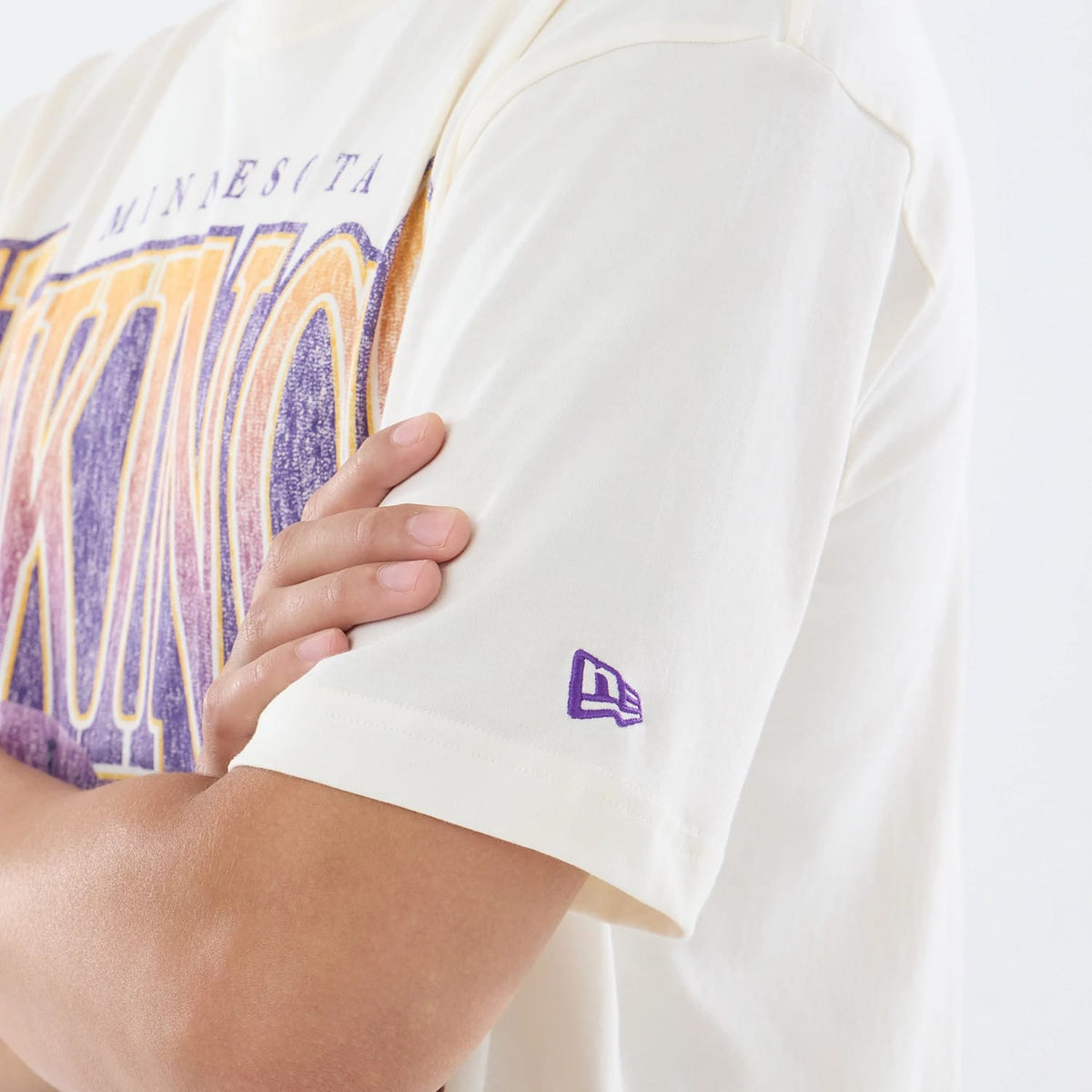 The model is wearing this NFL Sport Classic Minnesota Vikings T-Shirt in cream. 5