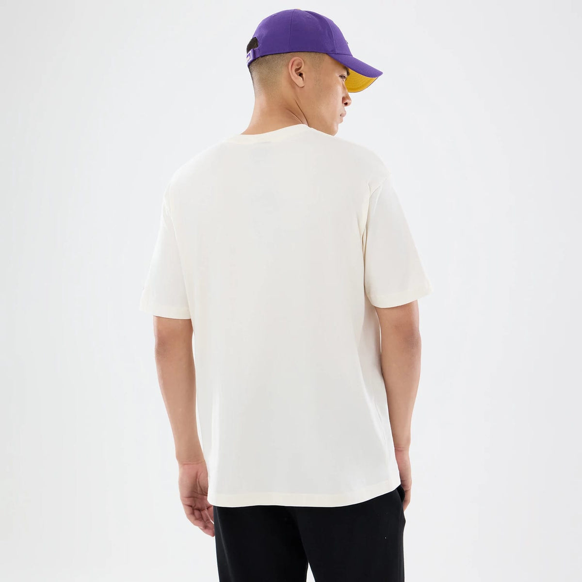 The model is wearing this NFL Sport Classic Minnesota Vikings T-Shirt in cream. 2